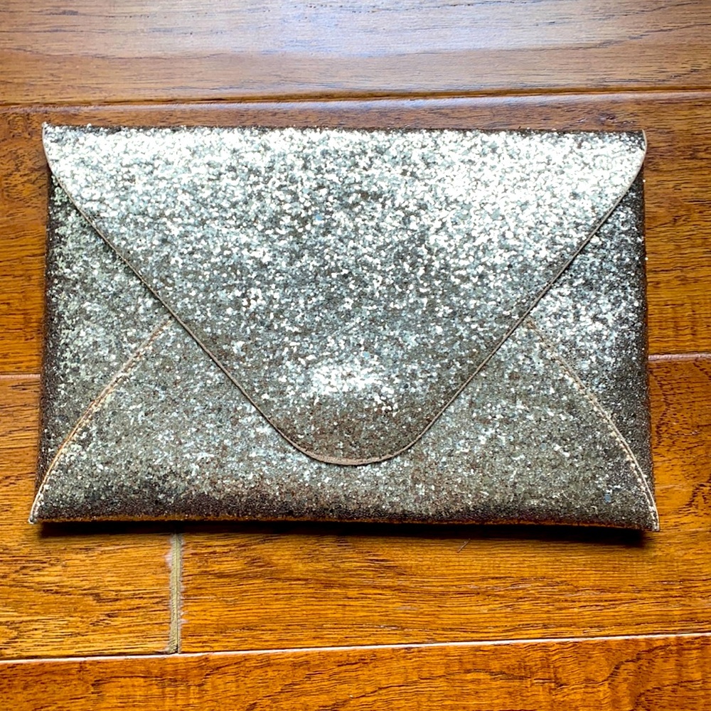 Gold glitter envelope clutch